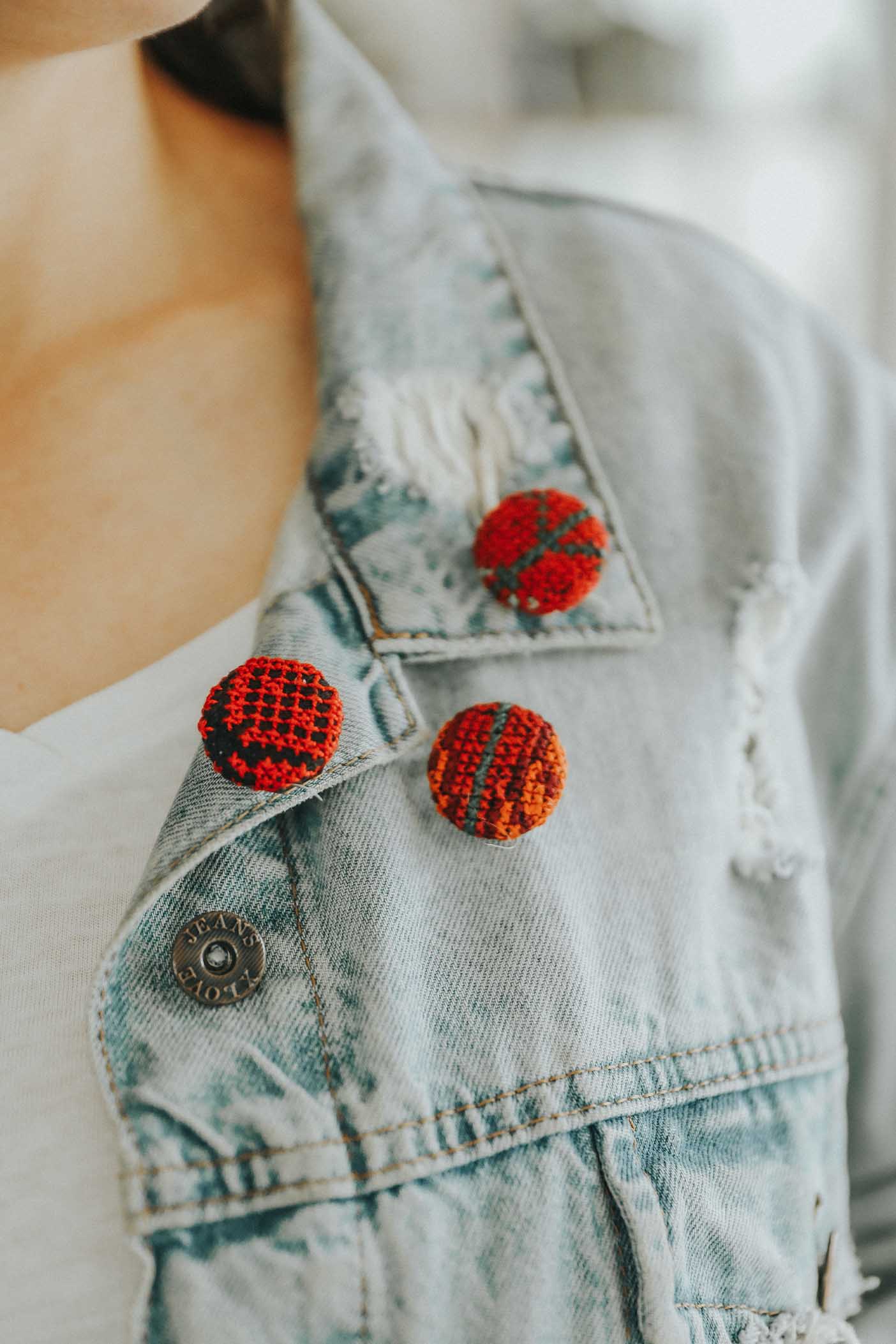 Three Embroidered Buttons